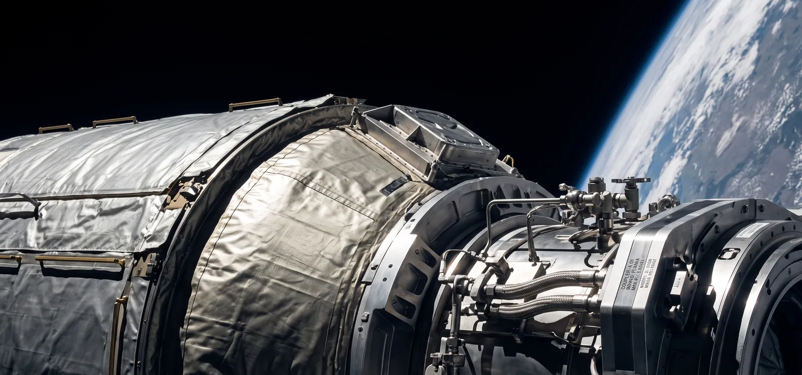 A large segmented space-telescope mirror undergoing assembly in a cleanroom